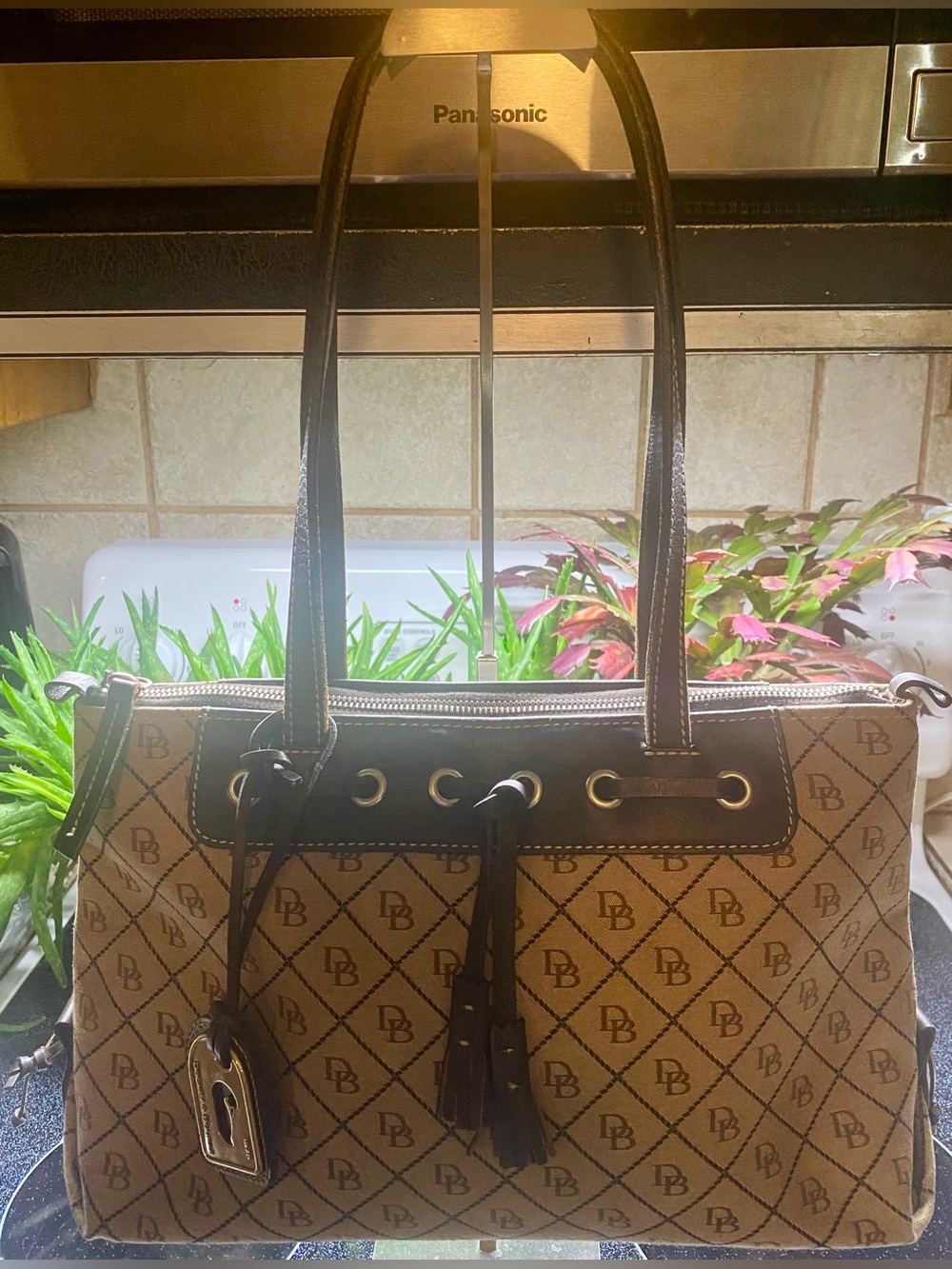 Dooney & Bourke Signature Tassel Shoulder Tote, iconic "DB" monogram pattern